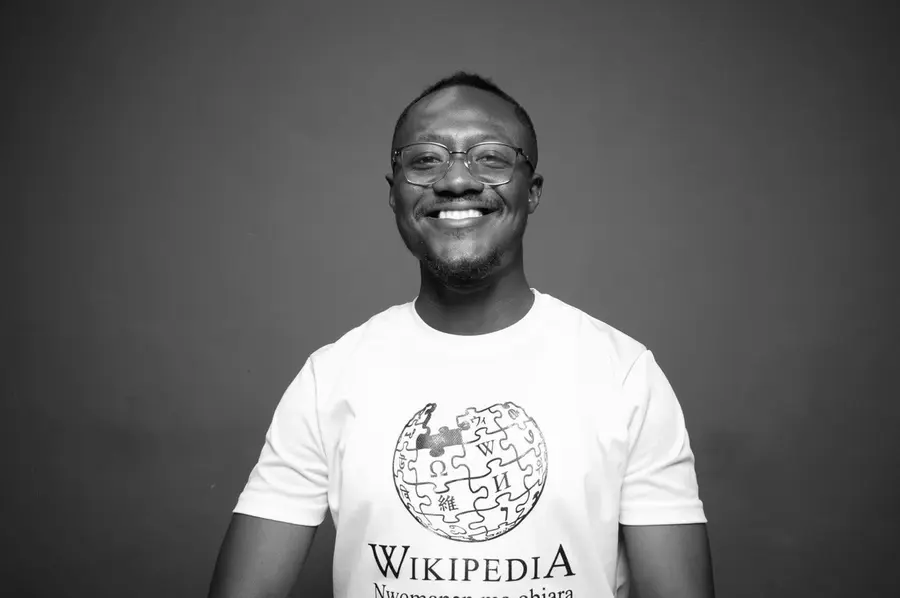Robert Okyere Obiri smiling in a Wikipedia shirt